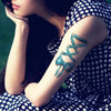 Tatouage temporaire hyperréaliste Big Bows & Ribbons de ArtWear Tattoo Divers Fantaisie sur le bras d'un homme et jambe d'une femme