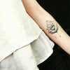 Tatouage temporaire hyperréaliste The 3 Lotus - Pack de ArtWear Tattoo Mandala sur le bras d'un homme et jambe d'une femme