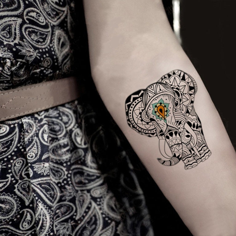Tatouage temporaire hyperréaliste Elephants de ArtWear Tattoo Animaux sur le bras d'un homme et jambe d'une femme