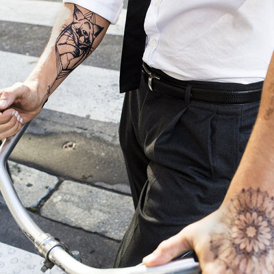 Tatouage temporaire hyperréaliste Three Eyed Cat de ArtWear Tattoo Animaux sur le bras d'un homme et jambe d'une femme