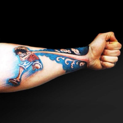 Tatouage temporaire hyperréaliste Power 3D - Pack de ArtWear Tattoo Cartoon sur le bras d'un homme et jambe d'une femme
