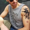 Tatouage temporaire hyperréaliste Revolution de ArtWear Tattoo Cartoon sur le bras d'un homme et jambe d'une femme