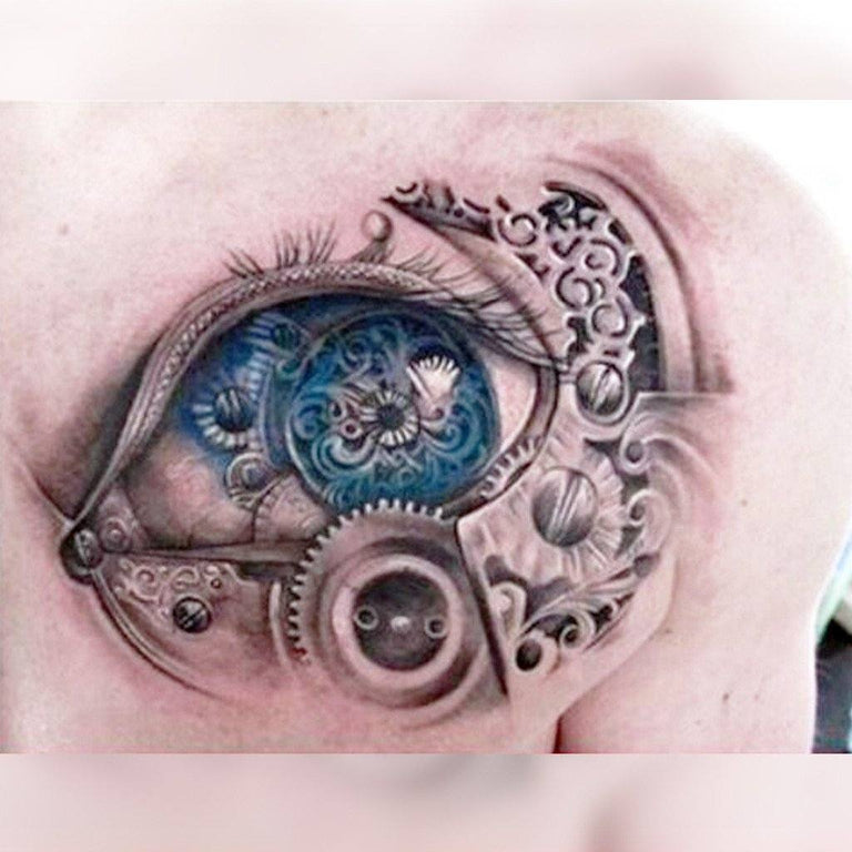 Tatouage temporaire hyperréaliste Blue Mechanical Eyes - Pack de ArtWear Tattoo Divers Fantaisie sur le bras d'un homme et jambe d'une femme
