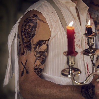 Tatouage temporaire hyperréaliste Scary Motherf*cker 2 de ArtWear Tattoo Divers Fantaisie sur le bras d'un homme et jambe d'une femme