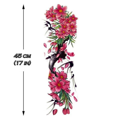 Tatouage temporaire hyperréaliste Cherry Tree & Flowers Sleeve de ArtWear Tattoo Fleurs sur le bras d'un homme et jambe d'une femme