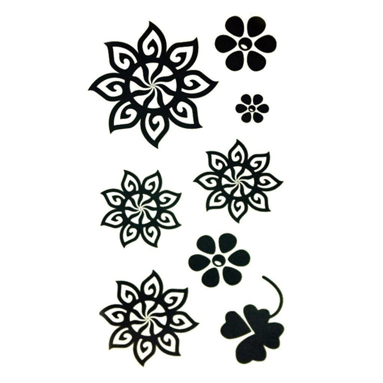 Tatouage temporaire hyperréaliste Multi Flowers - Pack de ArtWear Tattoo Fleurs sur le bras d'un homme et jambe d'une femme