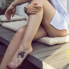 Tatouage temporaire hyperréaliste Origin of the Sea - Pack de ArtWear Tattoo Géométriques sur le bras d'un homme et jambe d'une femme