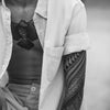Tatouage temporaire hyperréaliste Polynesian Sleeve 2 de ArtWear Tattoo Maori/Polynésien sur le bras d'un homme et jambe d'une femme