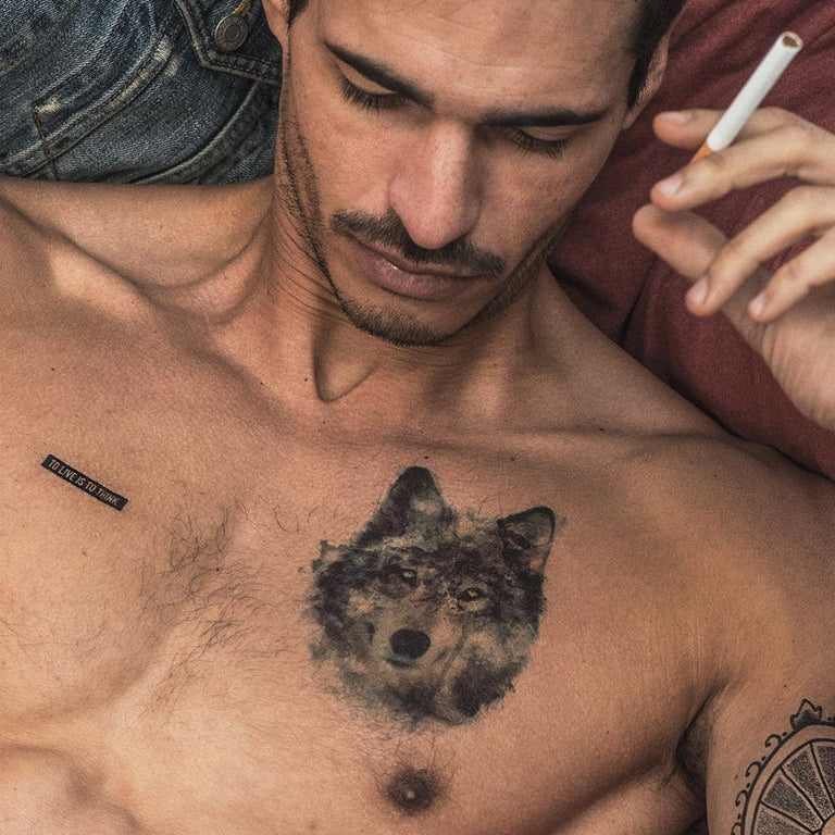 Tatouage temporaire hyperréaliste Multi - Pack de ArtWear Tattoo Minimalistes sur le bras d'un homme et jambe d'une femme