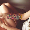 Tatouage temporaire hyperréaliste Sweet Wonderland de ArtWear Tattoo Old School sur le bras d'un homme et jambe d'une femme