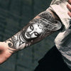 Tatouage temporaire hyperréaliste Buddha 1 de ArtWear Tattoo Religieux sur le bras d'un homme et jambe d'une femme