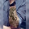 Tatouage temporaire hyperréaliste The Tiger de ArtWear Tattoo Traditionnels sur le bras d'un homme et jambe d'une femme