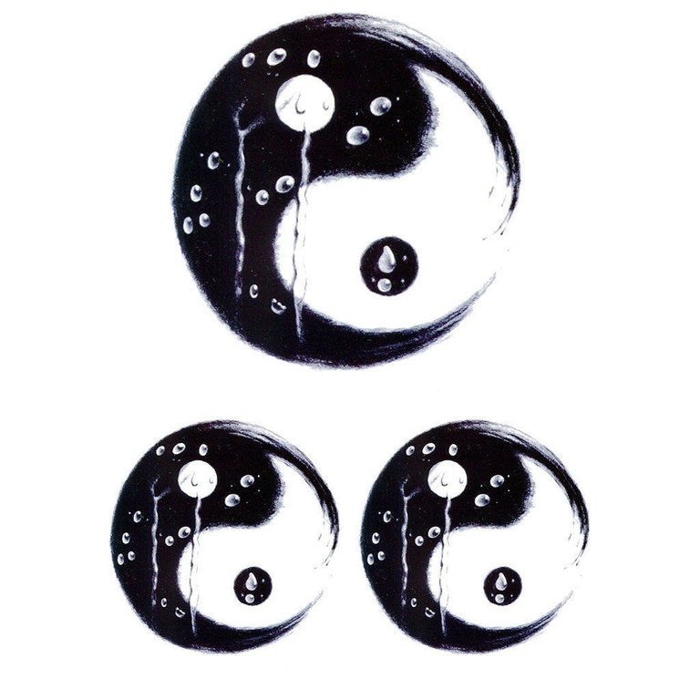 Tatouage temporaire hyperréaliste Yin & Yang de ArtWear Tattoo Traditionnels sur le bras d'un homme et jambe d'une femme